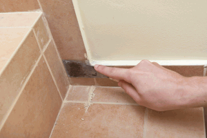 Removing hardened grout from tiles Removing hardened grout from tiles