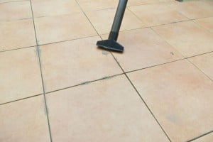 Cleaning the floor tiles Cleaning the floor tiles