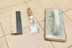 Tools for grouting floor tiles Tools for grouting floor tiles
