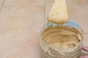 Mixing tile grout Mixing tile grout