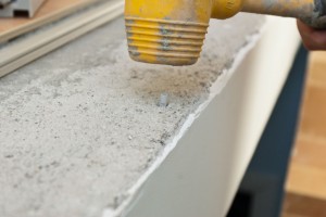 Inserting plastic dowel